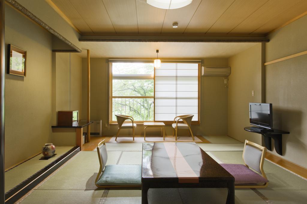 Готель Akita Onsen Plaza Номер фото